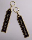 "Choose to Succeed" and "Failure is Not an Option" Keychain in Gold and Black - The Space Store
